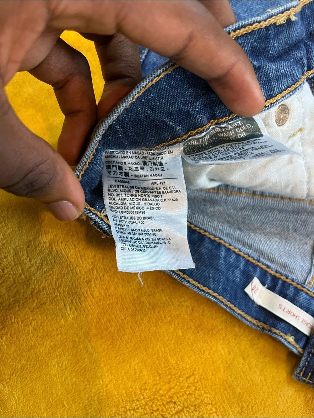 Levi’s High-Rise Distressed Denim Shorts — Blue